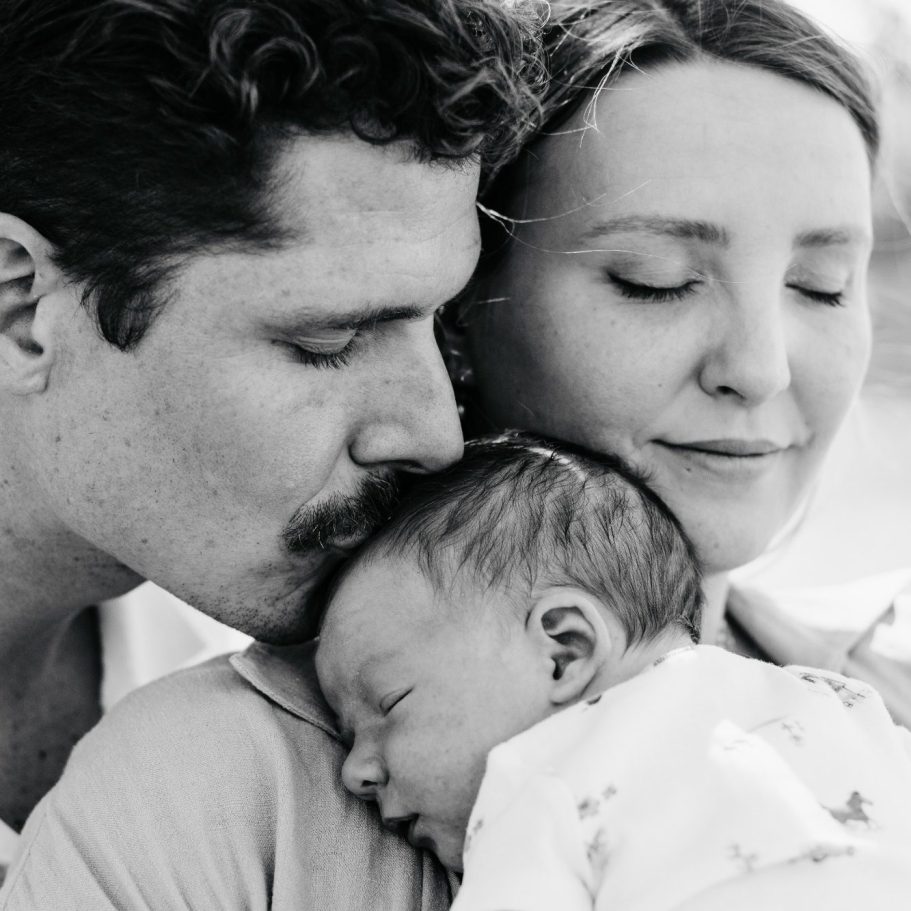 Candid family photography session at Mueller Lake Park in Austin, TX