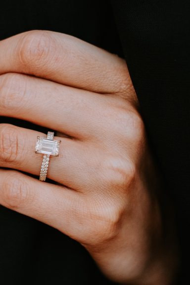Joyful couple walking together during their engagement session in Fort Worth