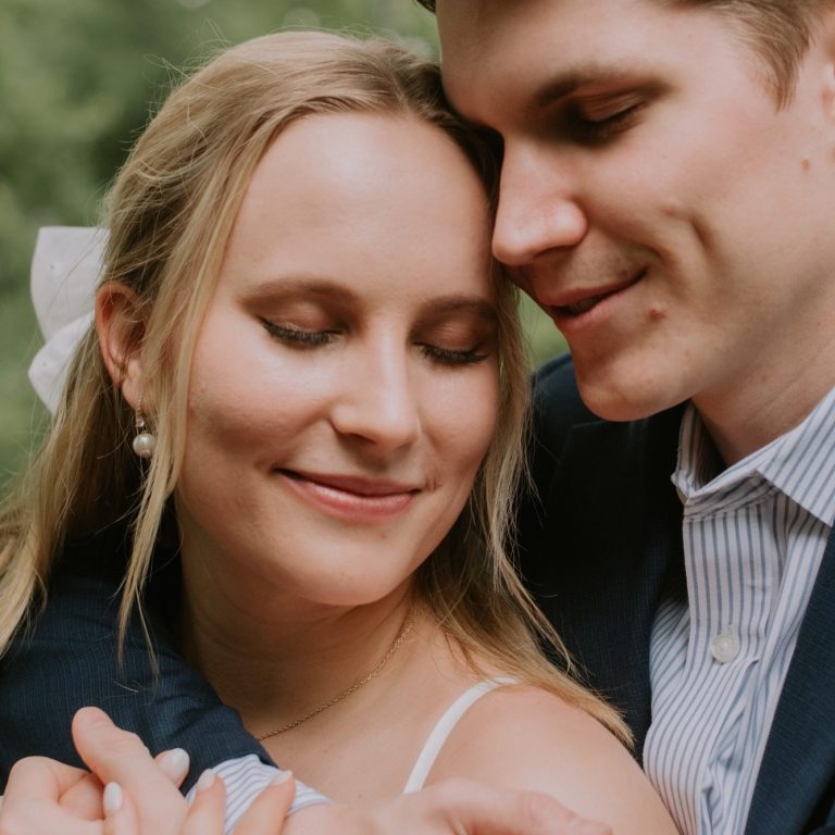Couple embracing during a Fort Worth engagement session