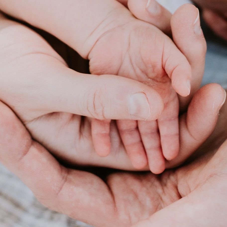 Joyful family portrait session in Austin, Texas at Mueller Lake Park