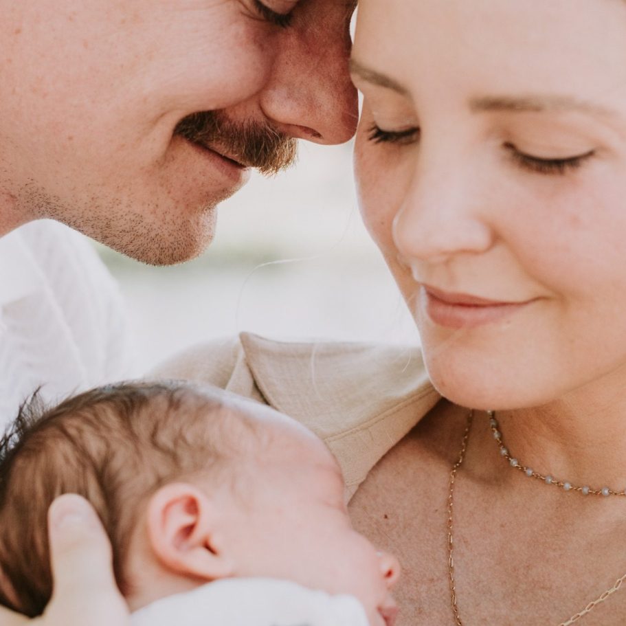 Parents and children during a family photoshoot at Mueller Lake Park